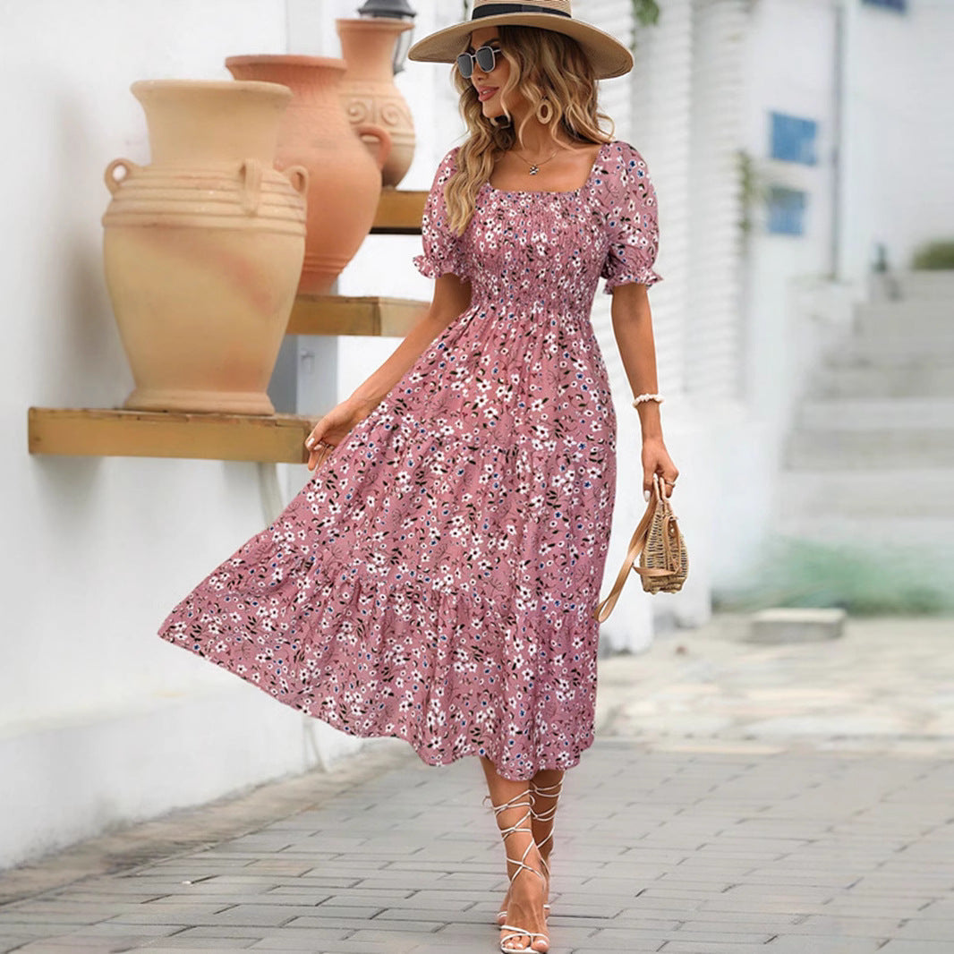 Tessa | Midi jurk met smock en bloemenprint