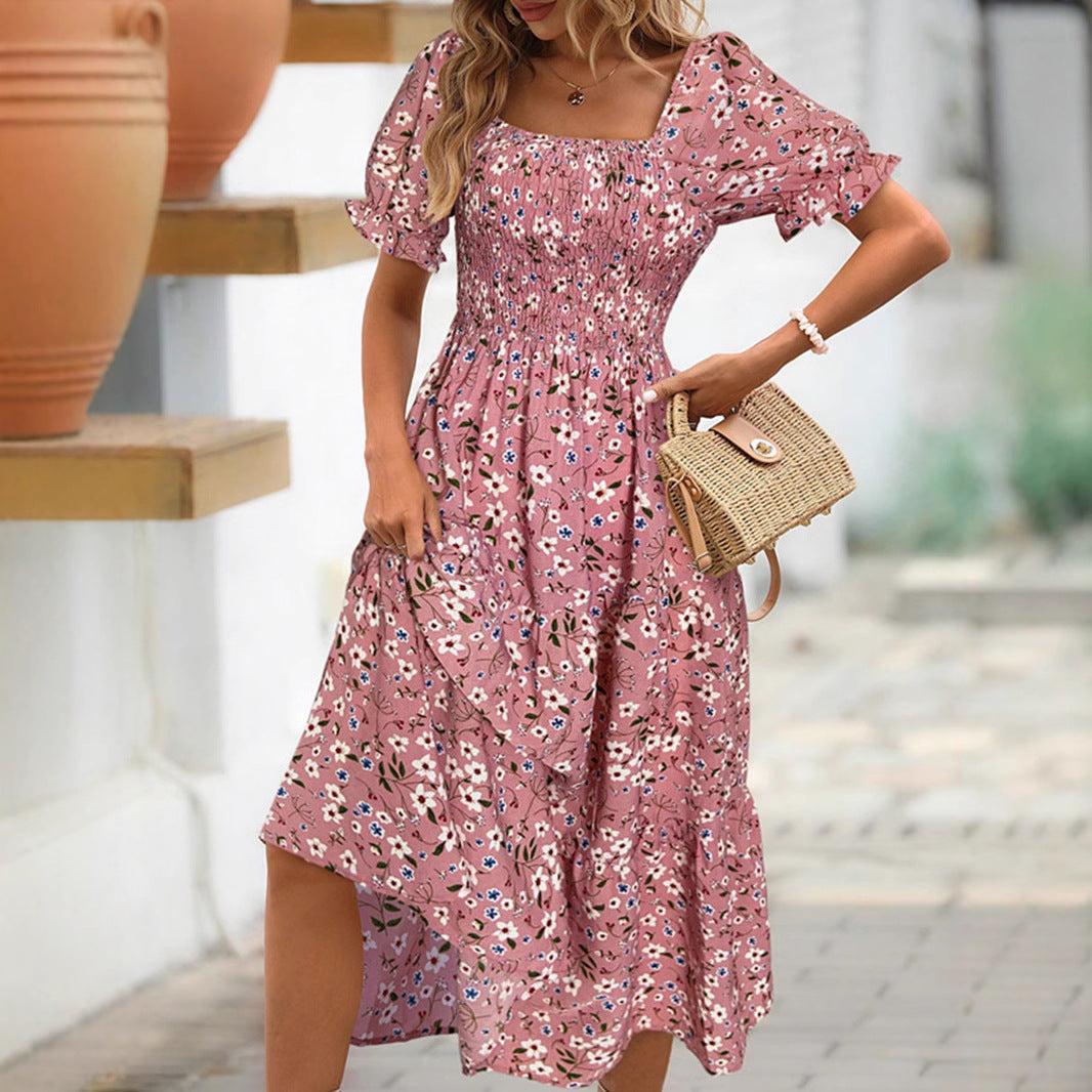 Tessa | Midi jurk met smock en bloemenprint